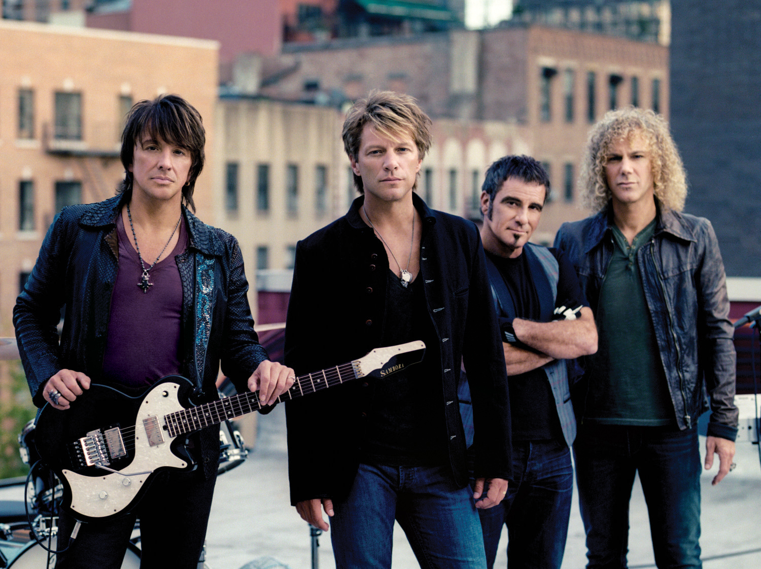 Member now. Бон Джови группа. Bon Jovi американская рок-группа. Постеры группы Бон Джови. Бон Джови группа в молодости.