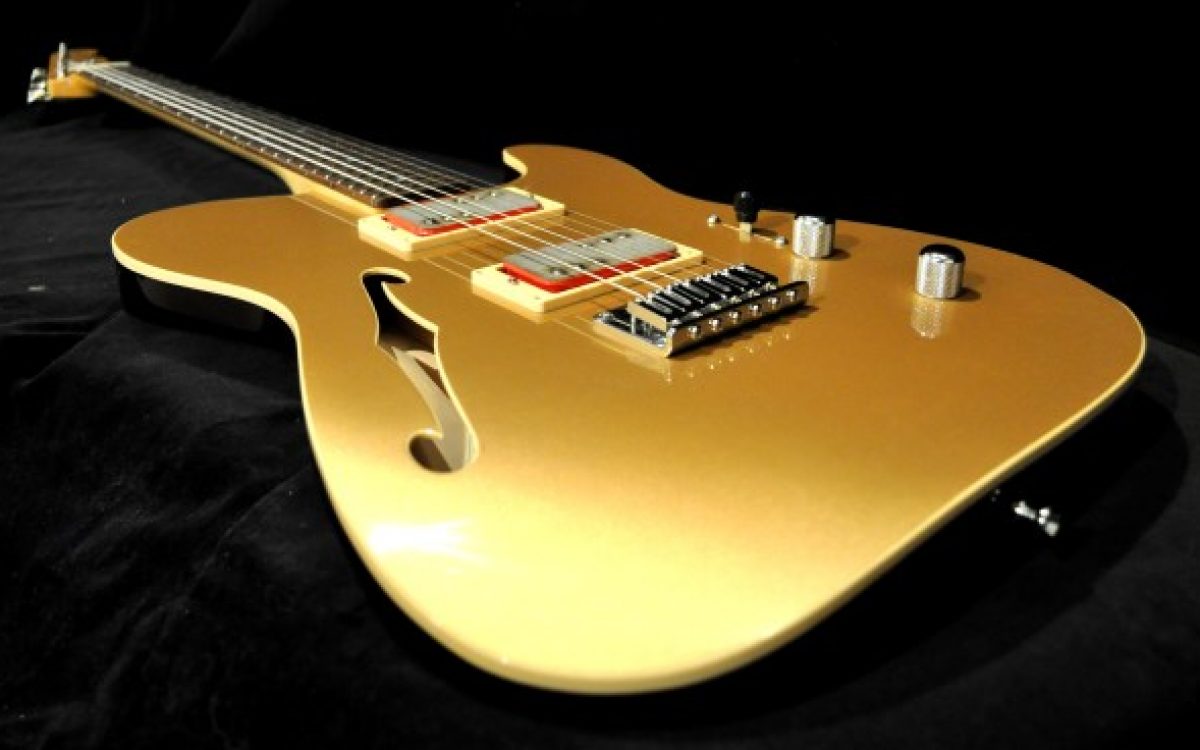 Who makes Billy Gibbons guitars?