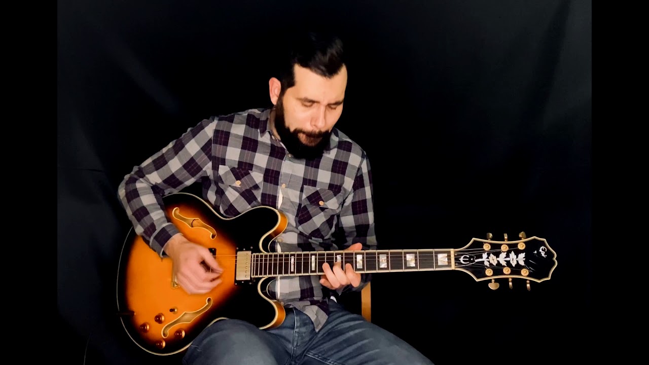 Who plays lead guitar on Kid Charlemagne?