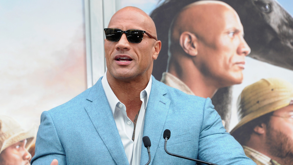 How many #1 movies does The Rock have?